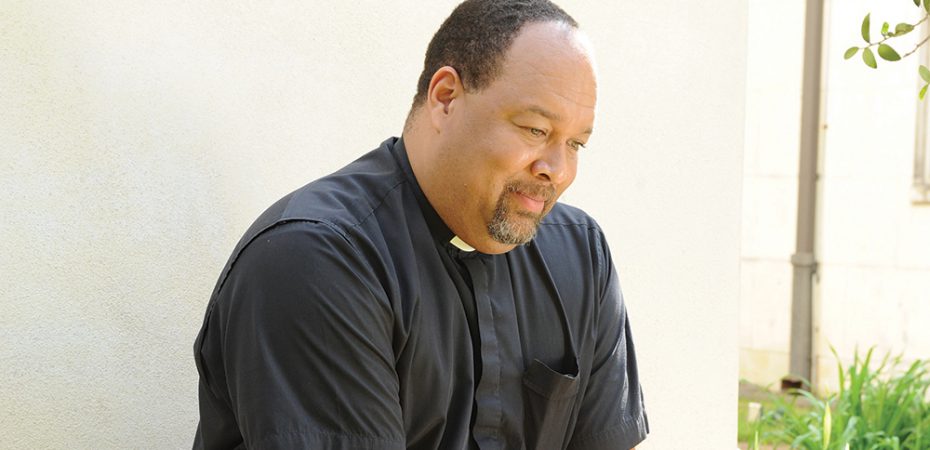 priest praying