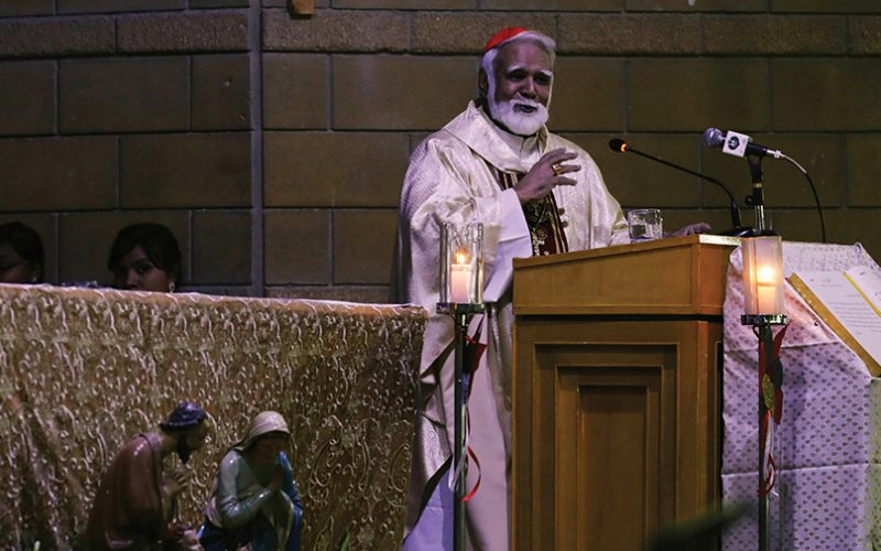 Joseph Cardinal Coutts, Archbishop of Karachi, addresses during a Christmas Eve service at the St. PatrickÕs Cathedral in Karachi,
