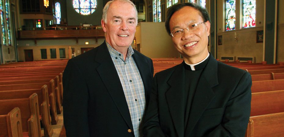 MINNESOTA PRIESTS WHO WORKED TO MERGE THEIR PARISHES POSE IN CHURCH